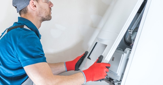 technician performing heating service